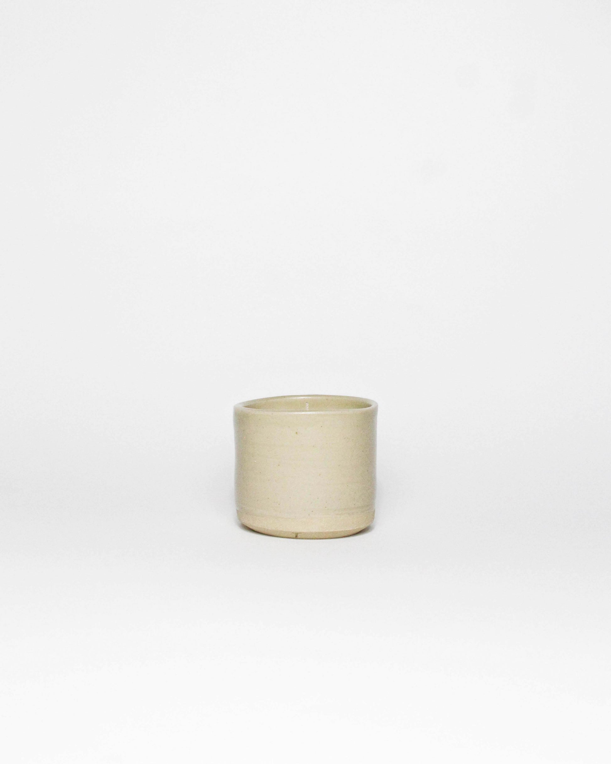 Bougie parfumée dans un mug en céramique Tassan
